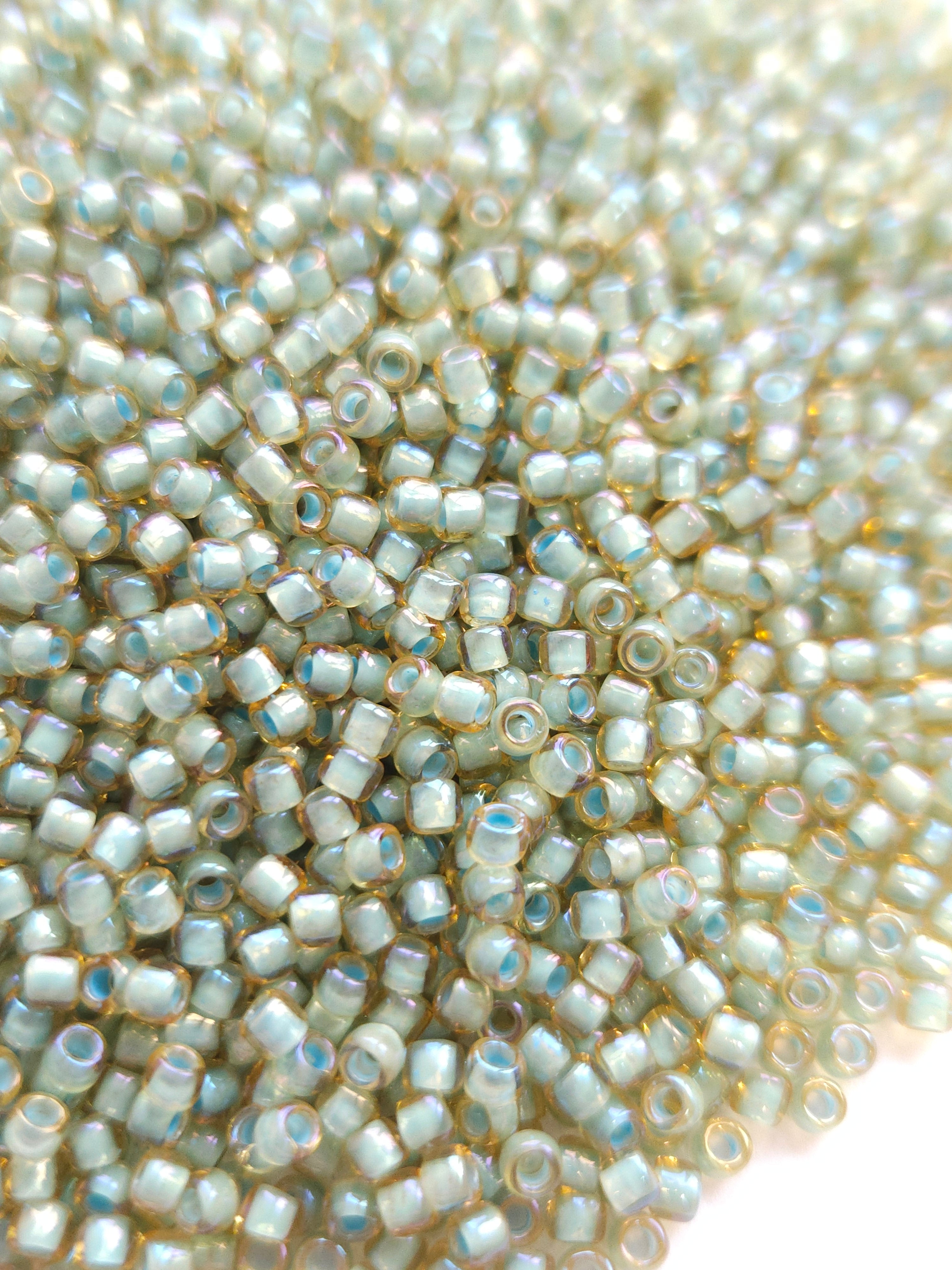 TOHO Seed Beads 8/0 Inside-color Rainbow Topaz/seafoam lnd