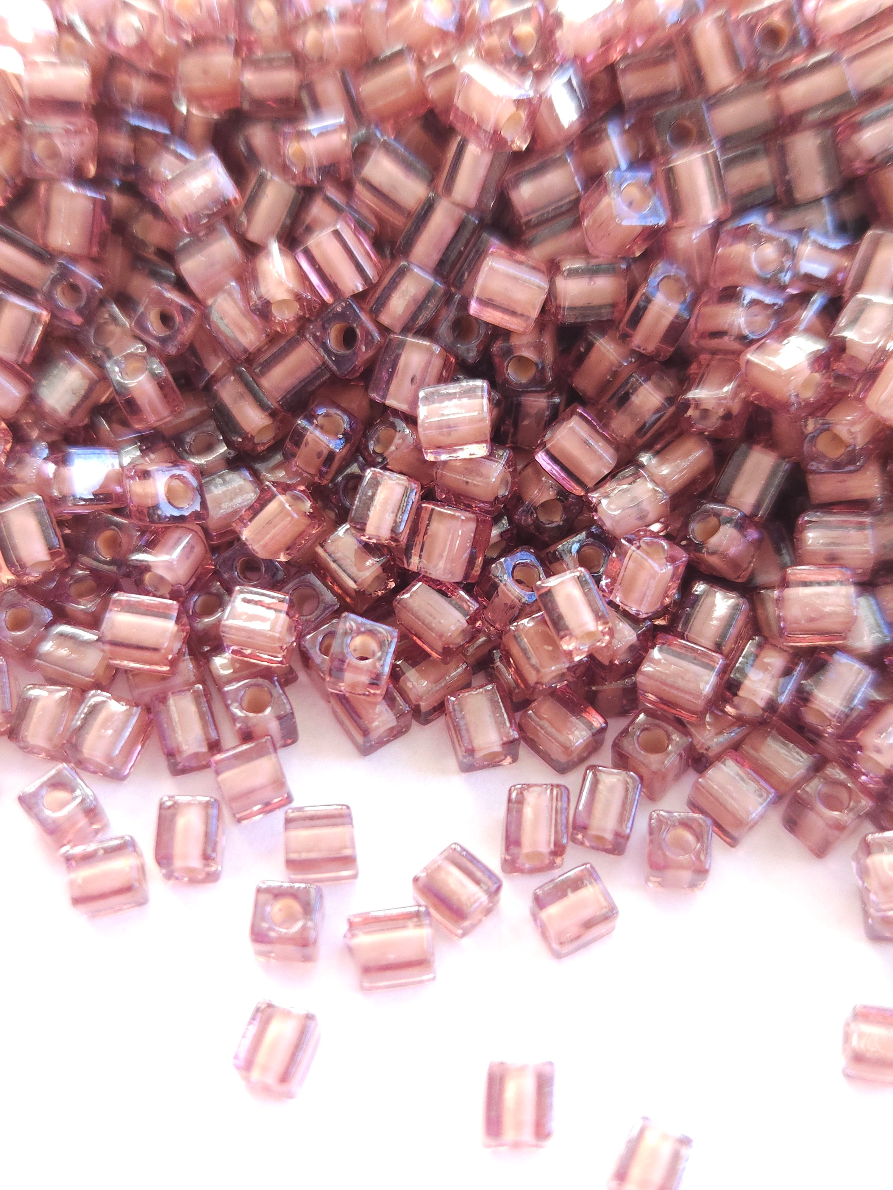 Miyuki Cubes 4mm White lined Pink