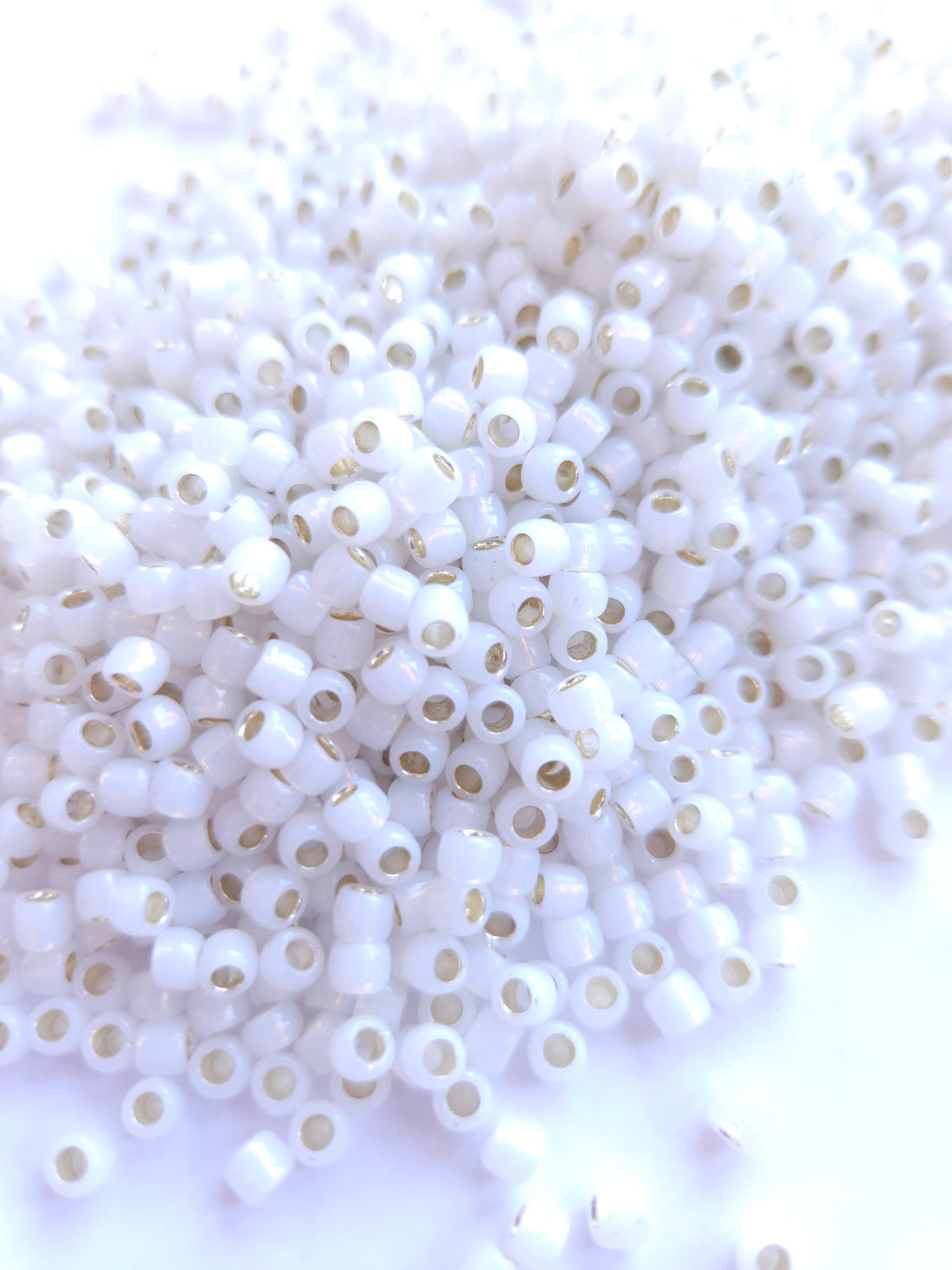 TOHO Seed Beads 6/0 Perma Finish Trans. S. Lined White TR-06-PF2100