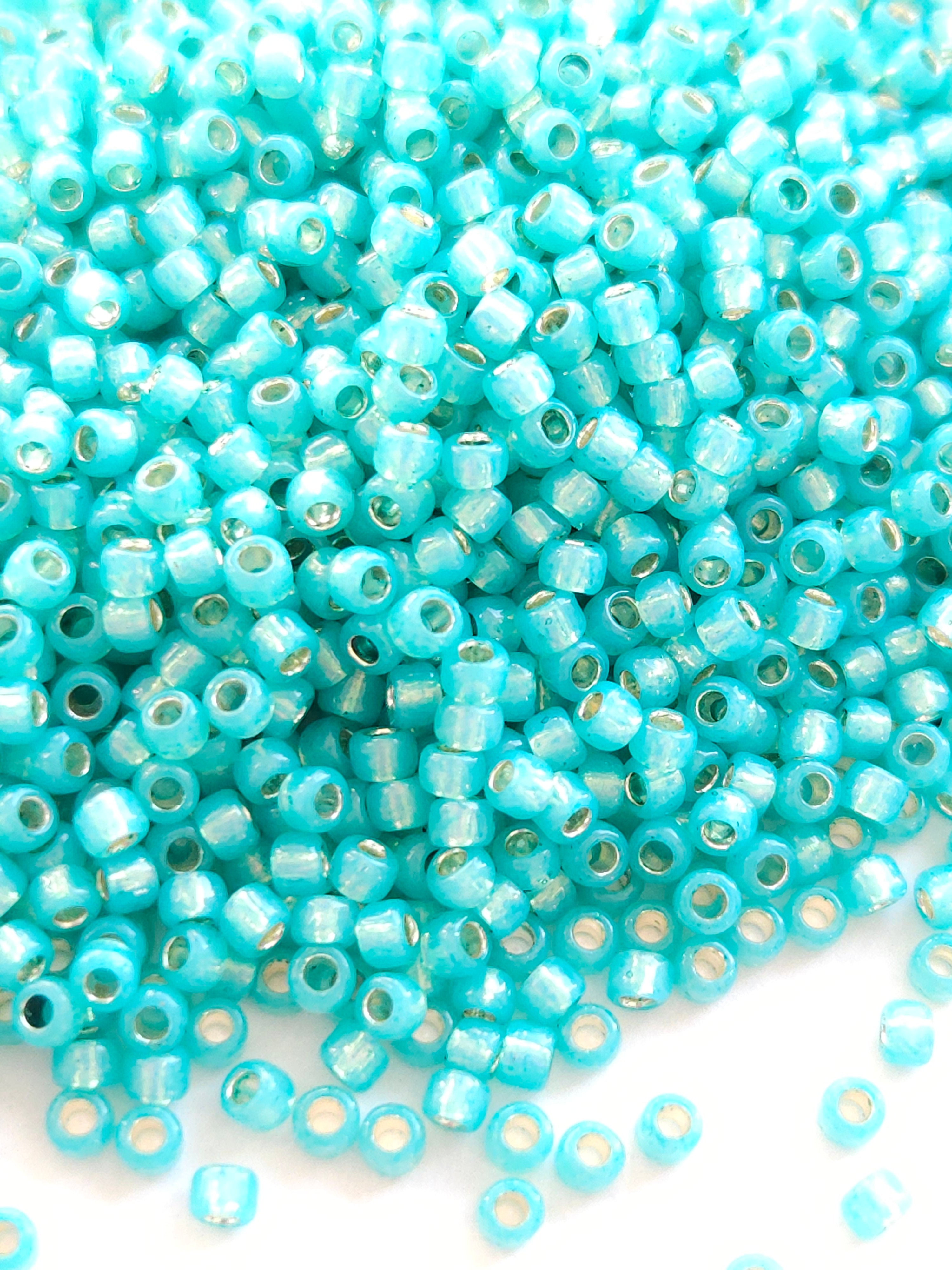 TR-08-2104 : TOHO - Round 8/0 : Silver-Lined Milky Teal