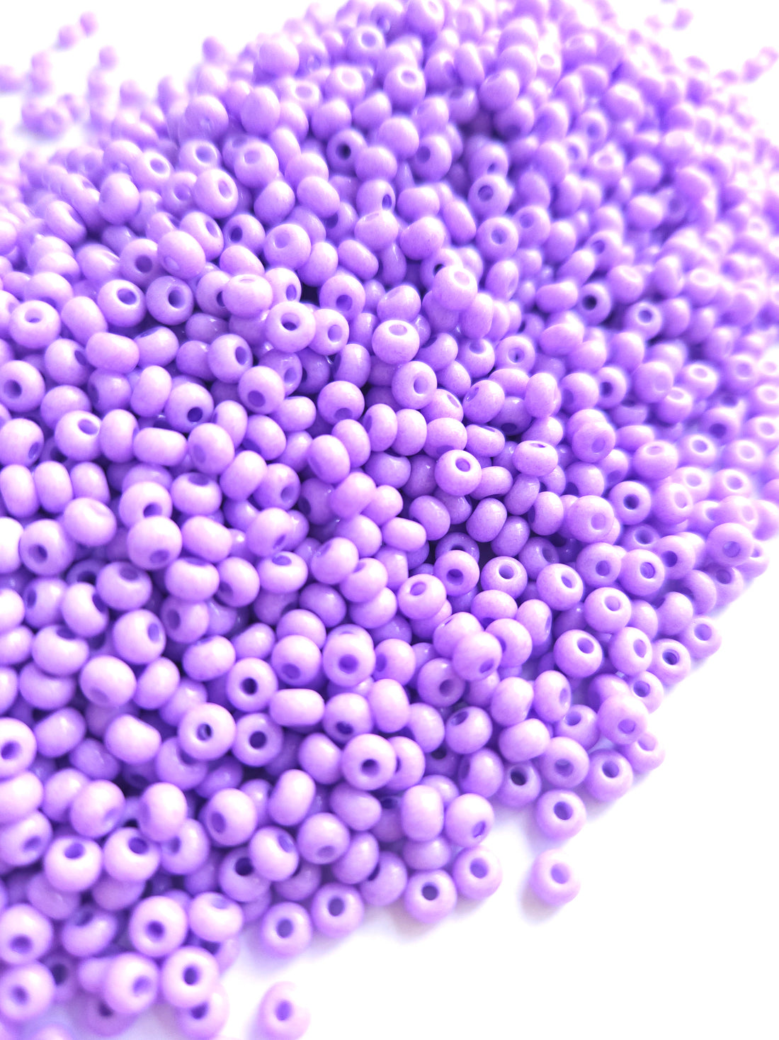 Tsjechische Rocailles 6/0 Amethyst Solgel