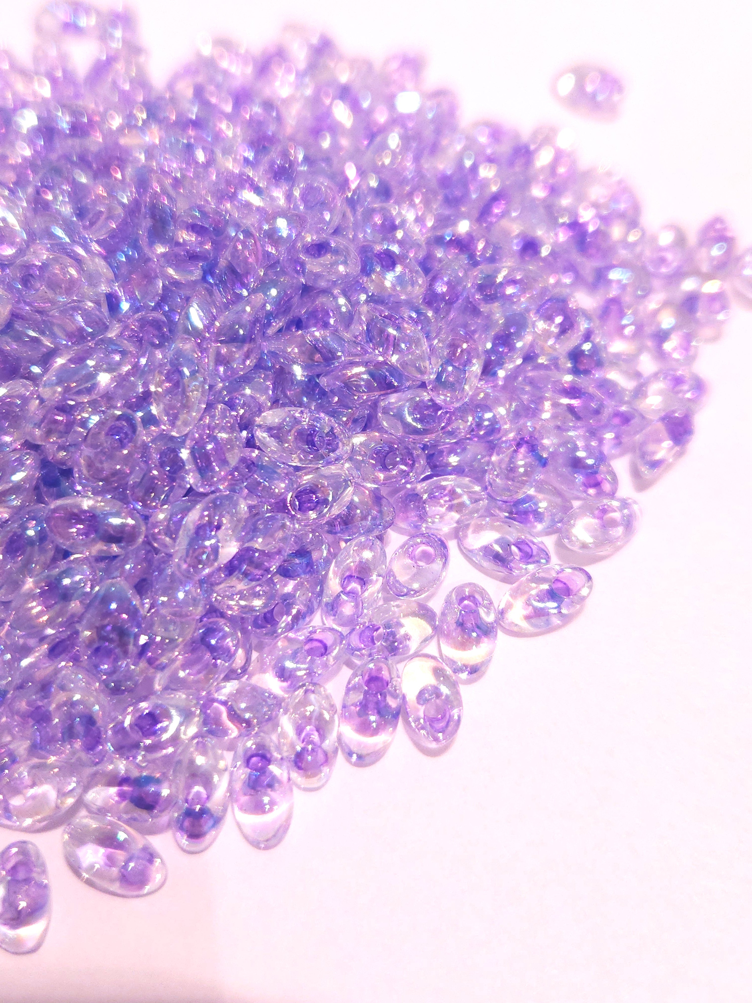 Miyuki Long Magatama 4x7 mm Lilac lined Crystal AB