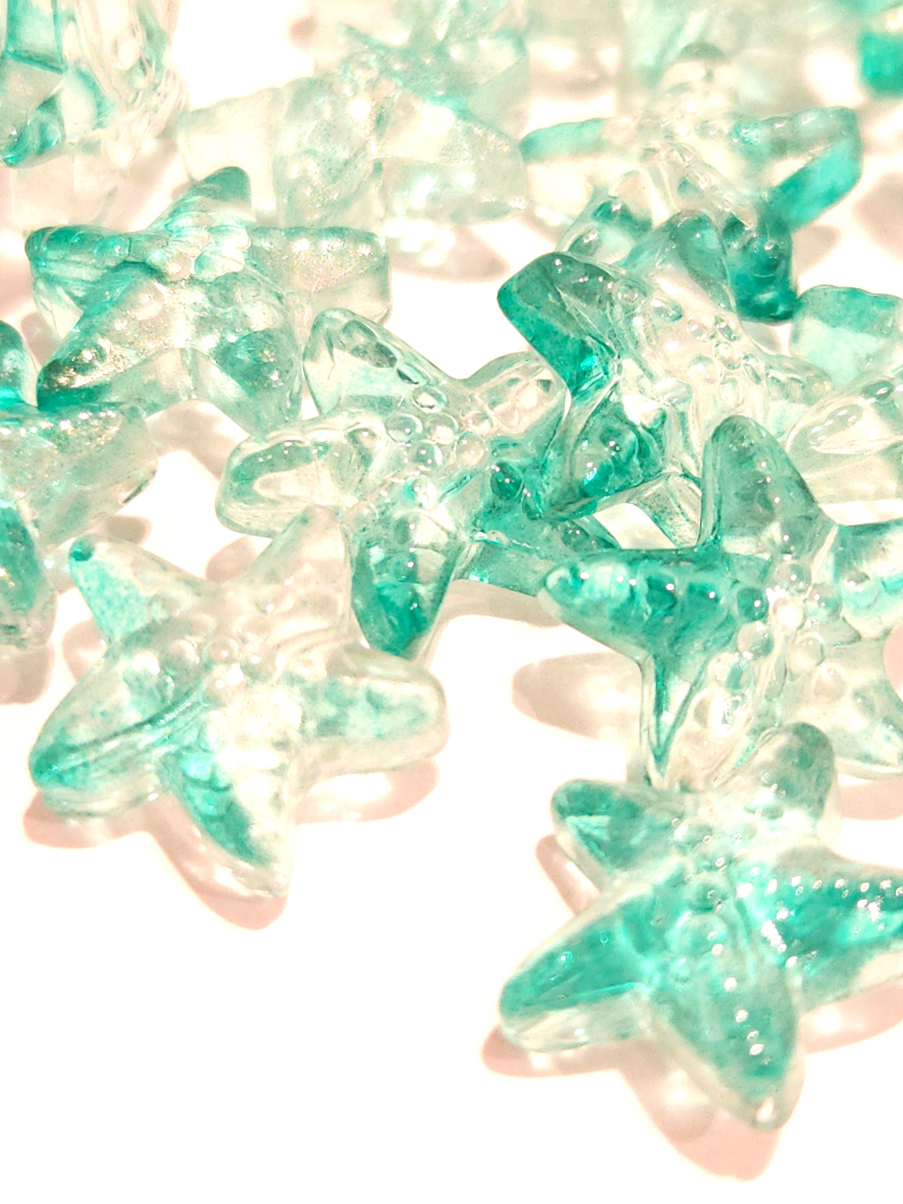 Zeester glaskraal turquoise zee thema