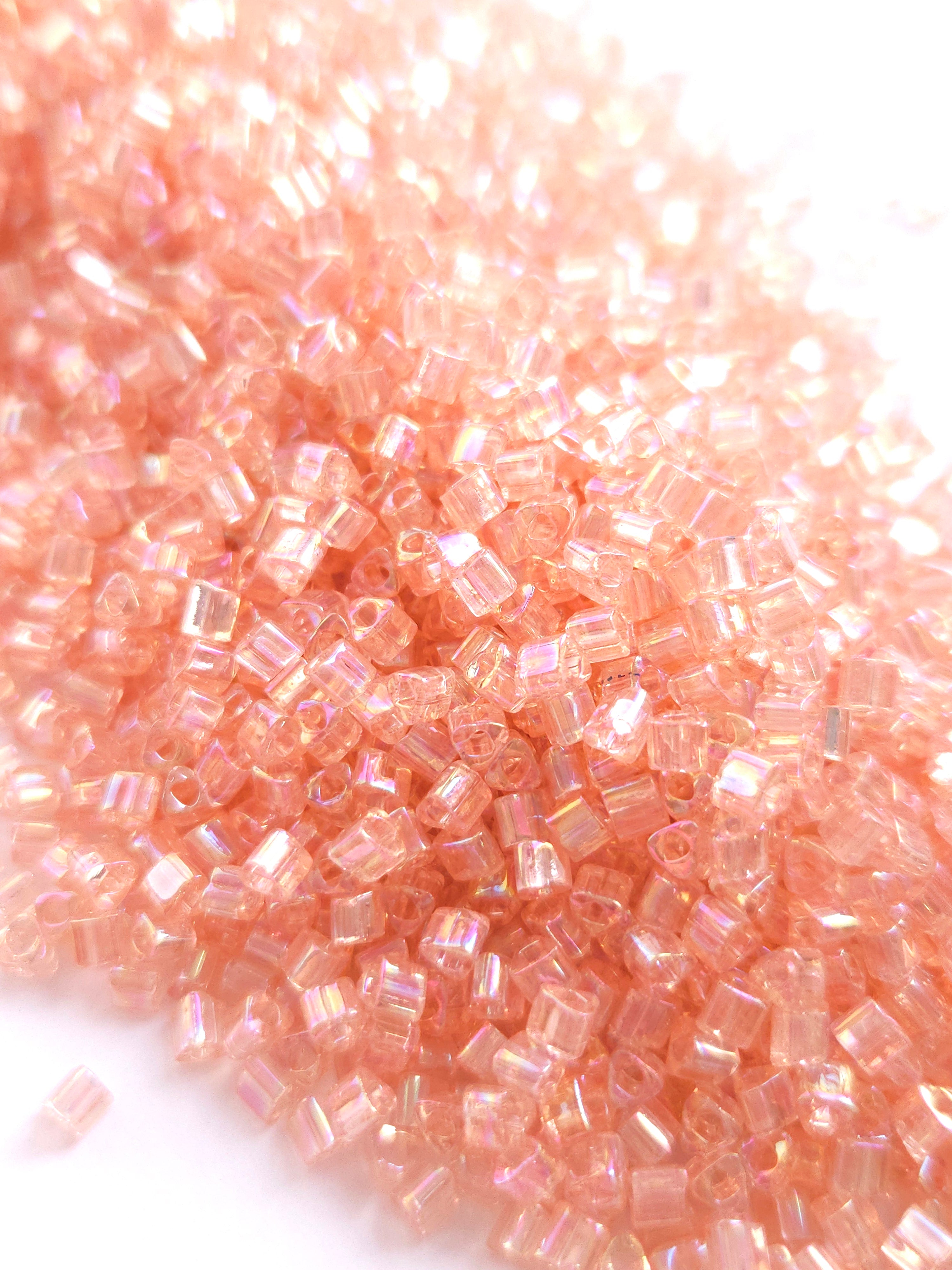 TOHO 8/0 Triangle Beads Transparent Rainbow Rosaline