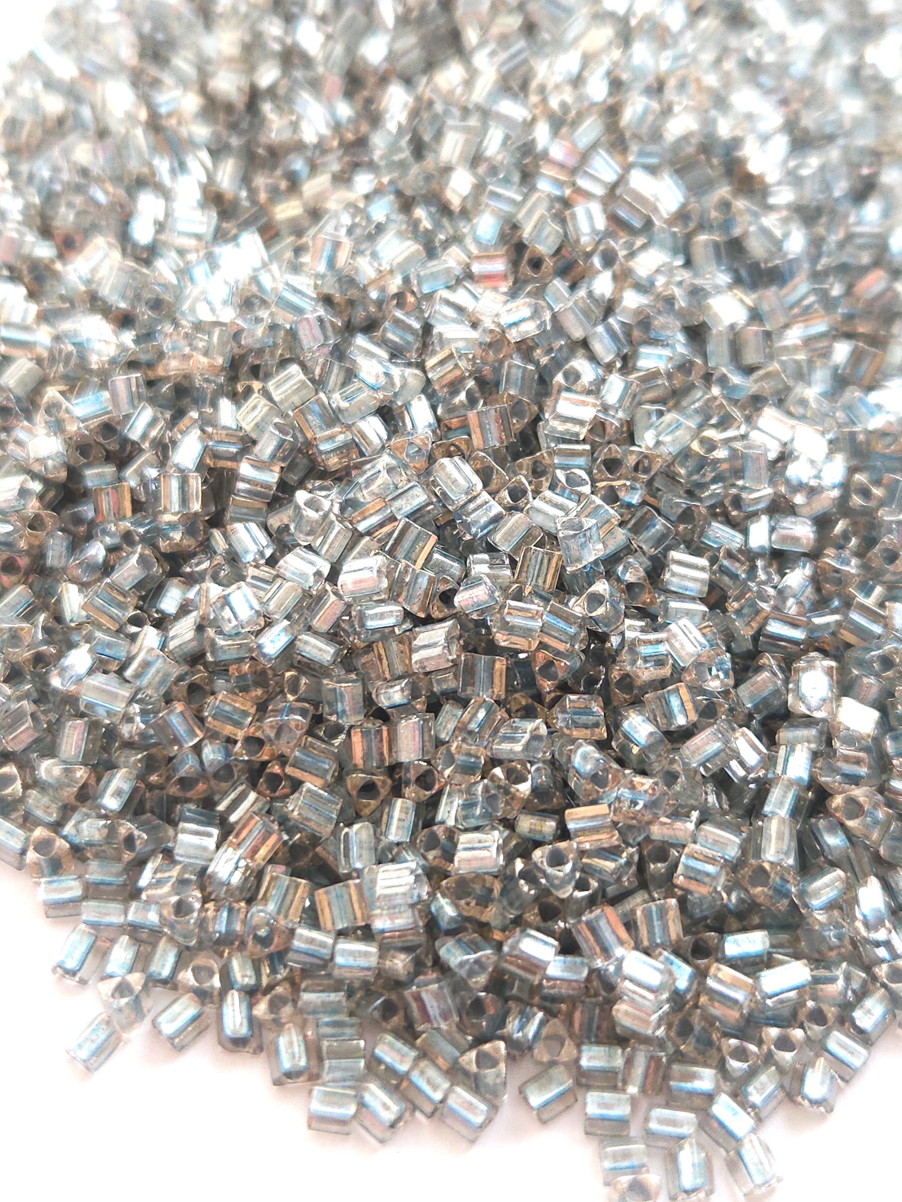 TOHO 8/0 Triangle Beads Inside Color Crystal Metallic Blue Lined