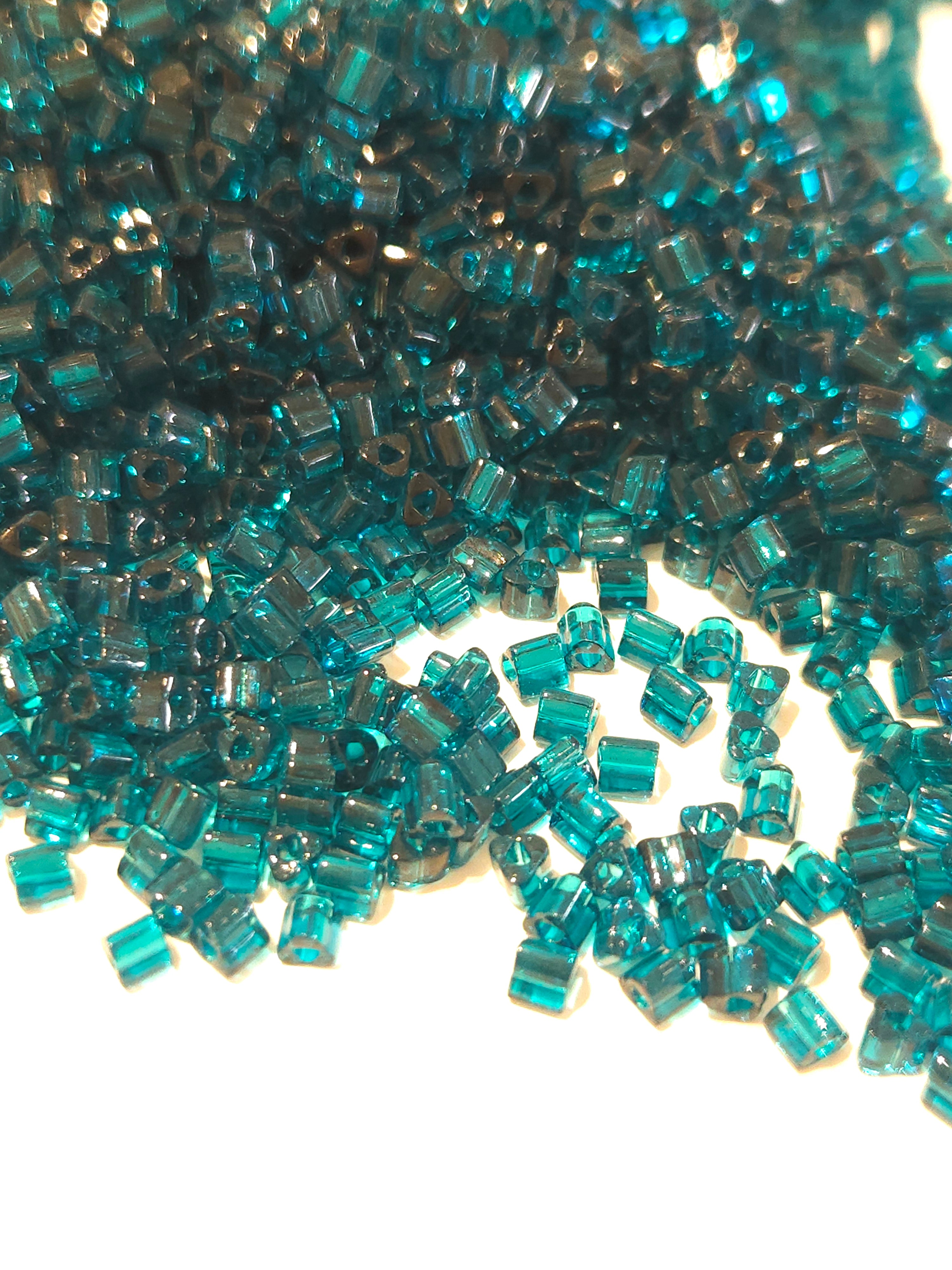 TOHO 8/0 Triangle Beads Transparent Capri Blue