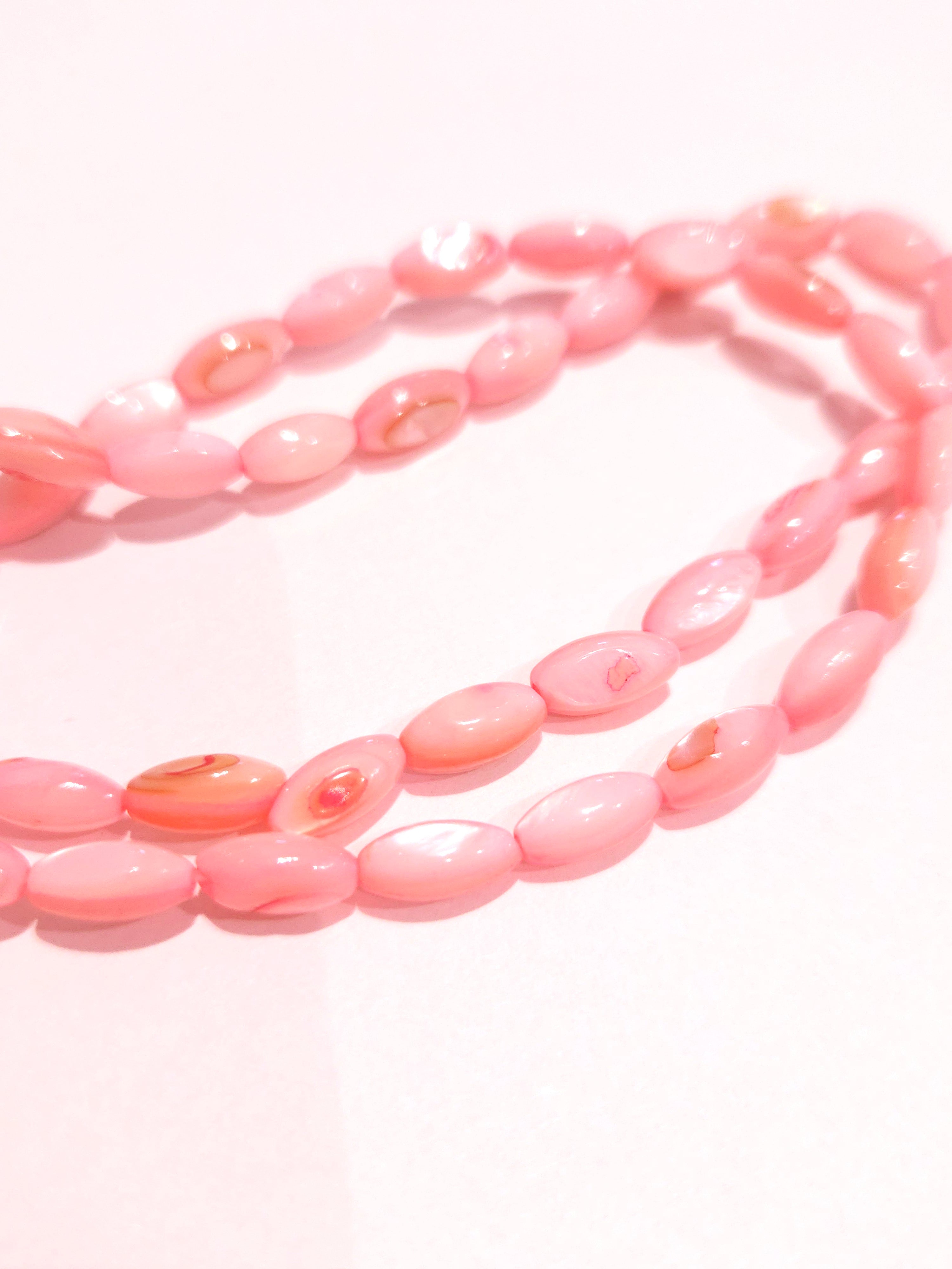 Zoetwater schelp kralen Roze ovaal 9x4x4mm per streng
