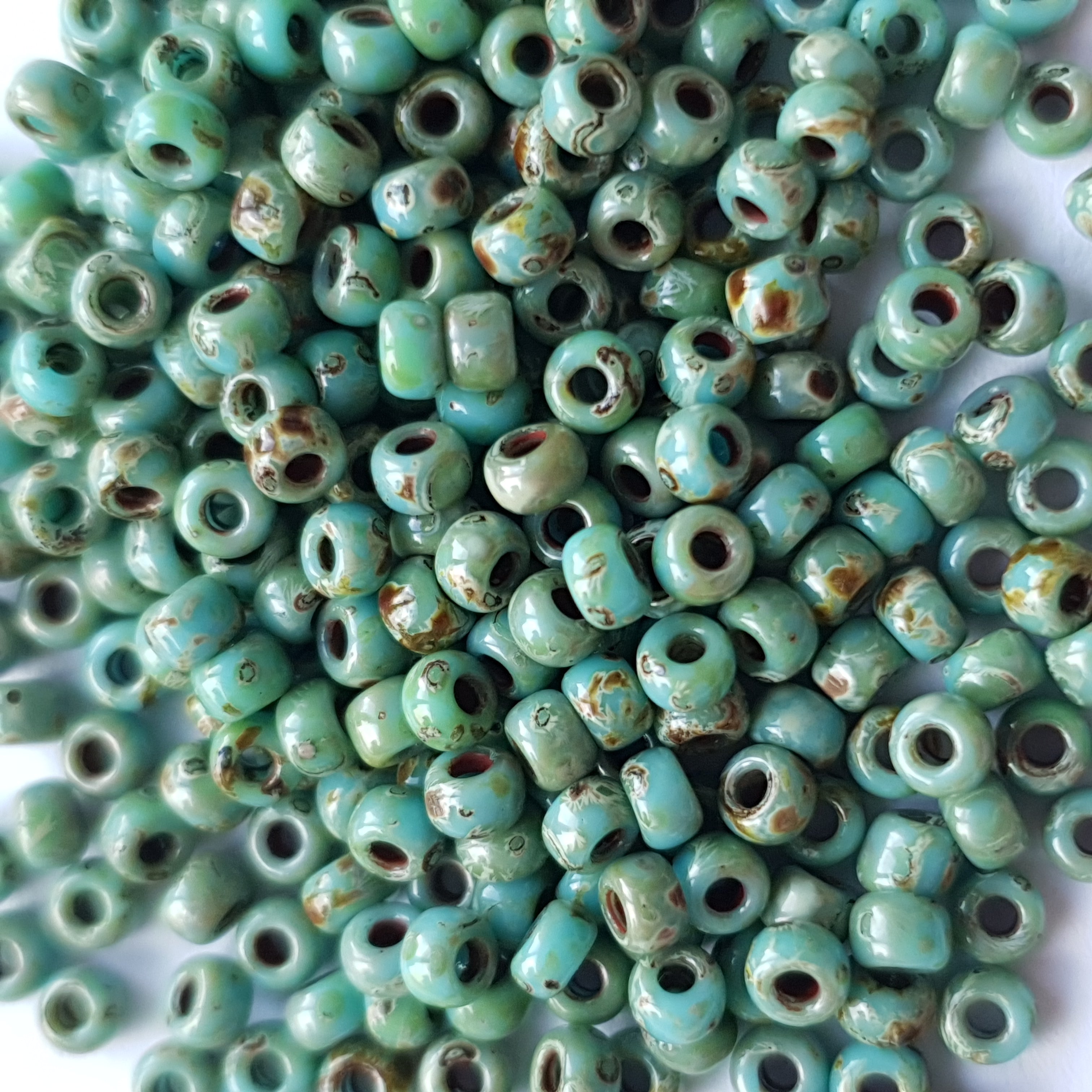 Miyuki 8/0 Rocailles picasso opaque seafoam green