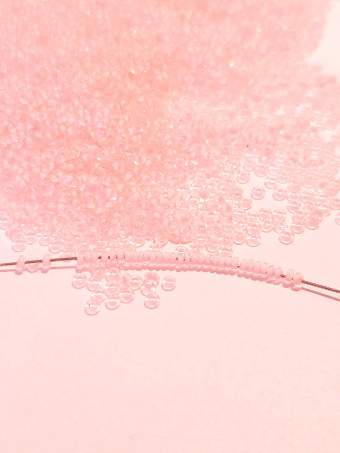 TOHO Demi Round 11/0 Inside color lined Crystal neon Rosaline