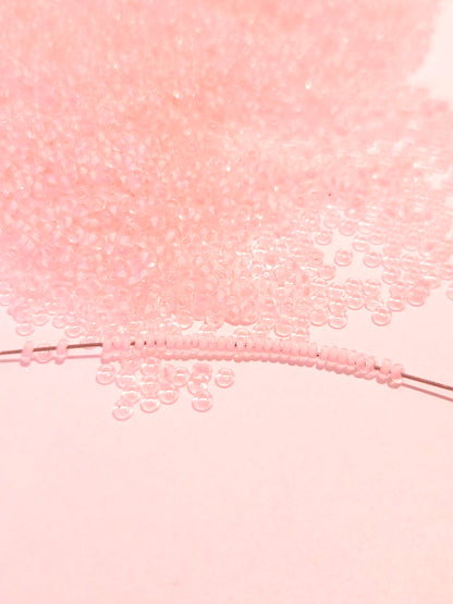 TOHO Demi Round 11/0 Inside color lined Crystal neon Rosaline