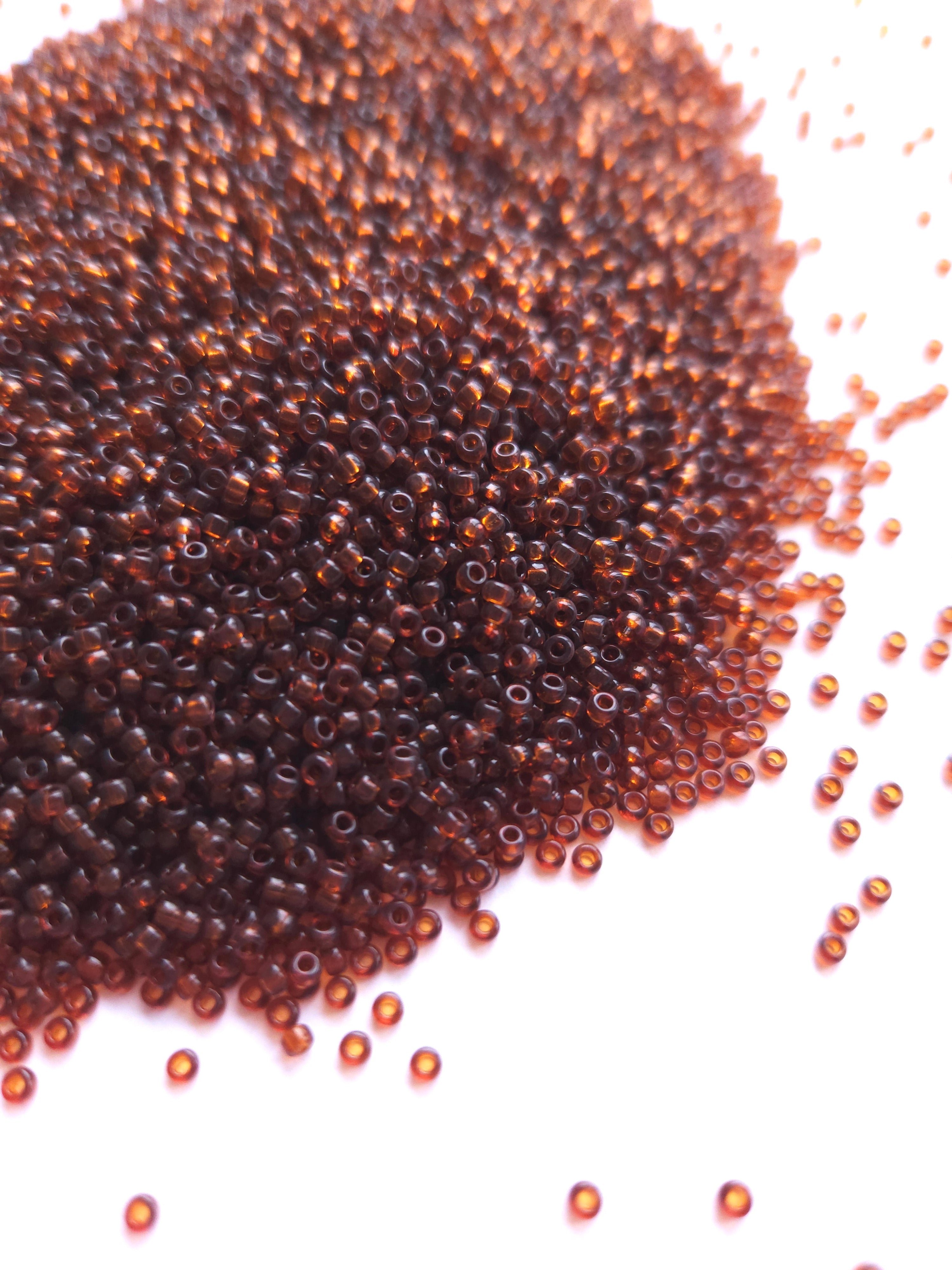 Miyuki Rocailles 11/0 Transparant Dark Topaz 134D
