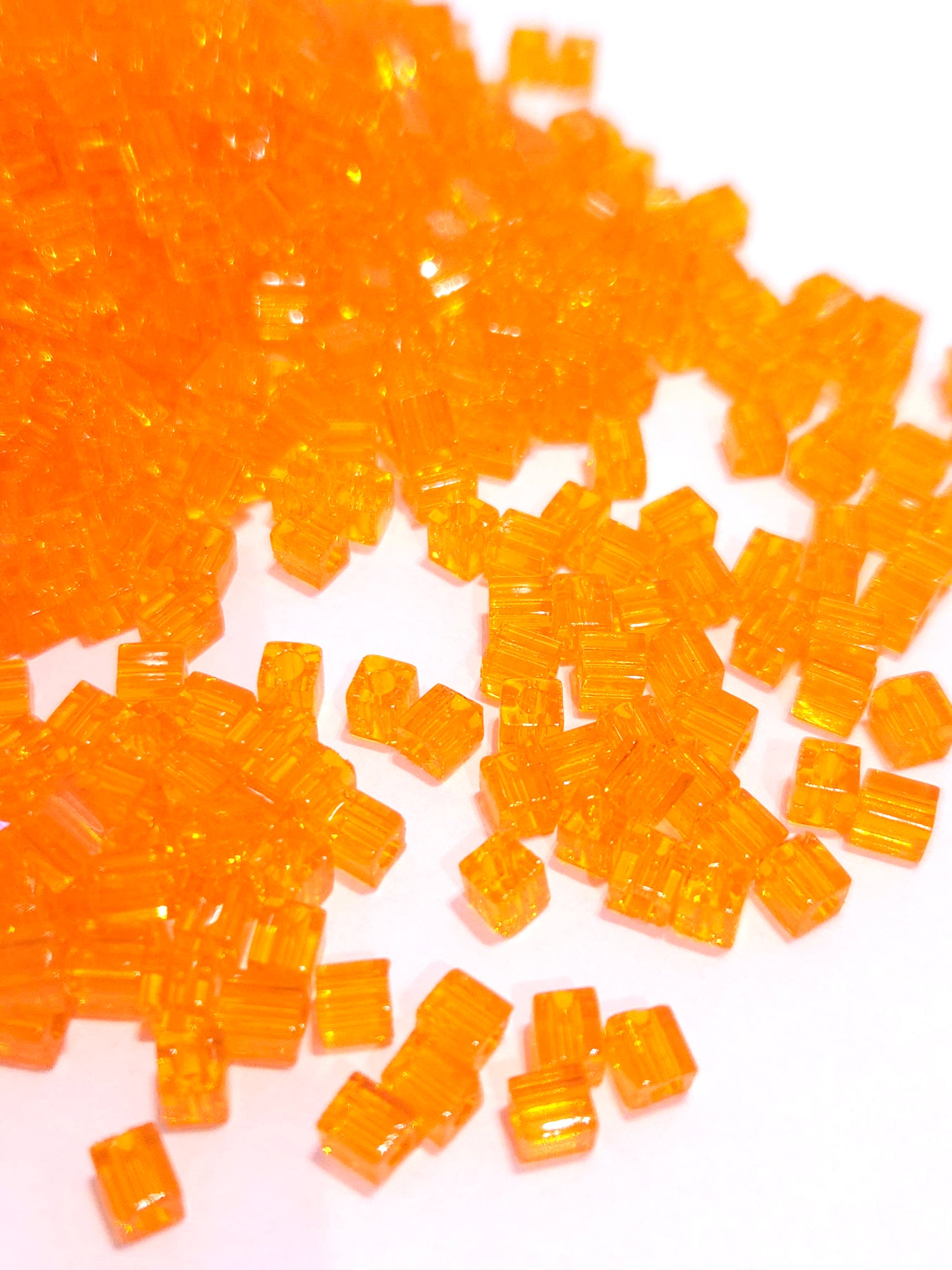 Miyuki Cubes 4mm Transparent Orange 0138