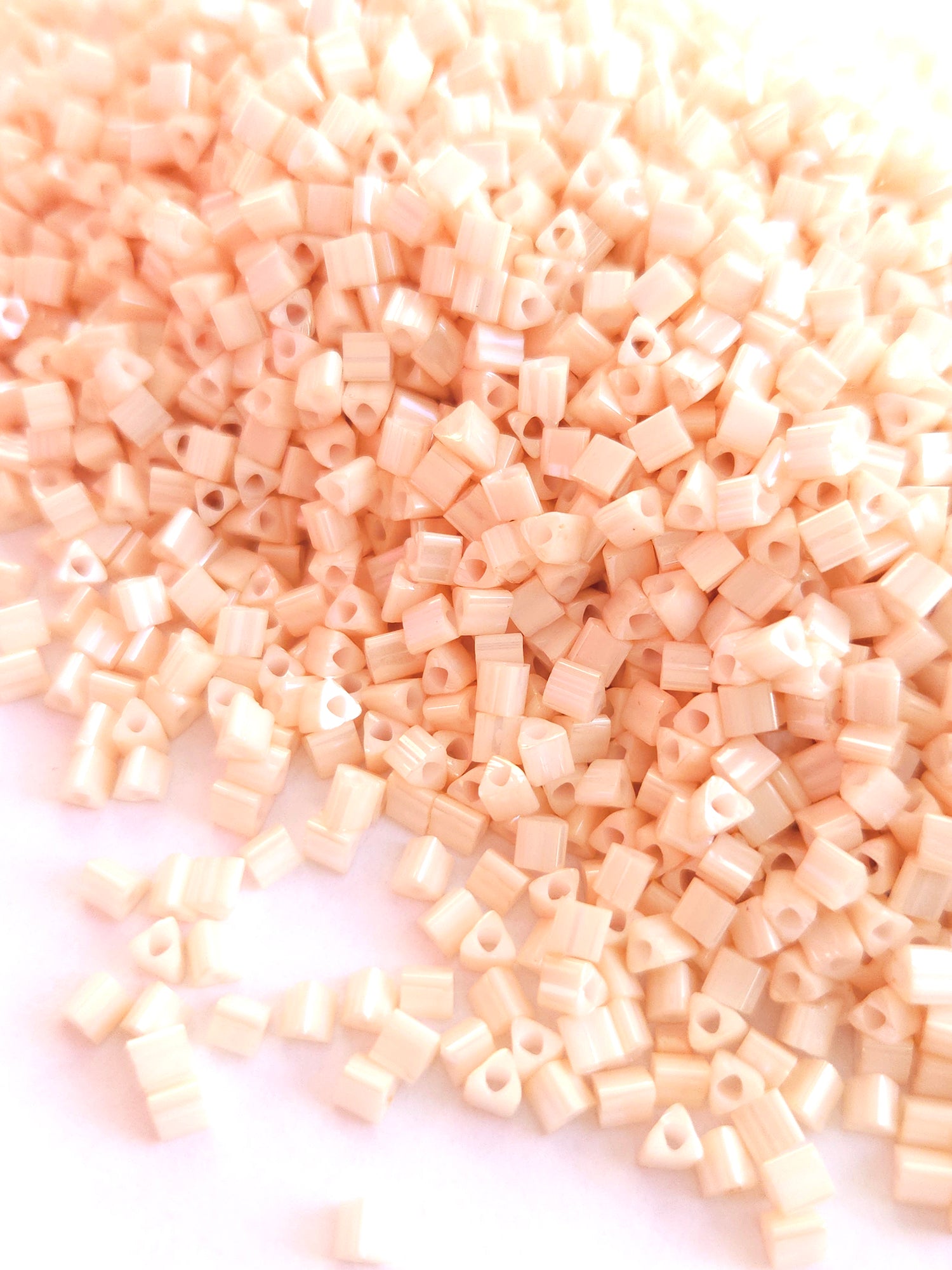 TOHO 8/0 Triangle Beads Opaque Lustered lt Beige