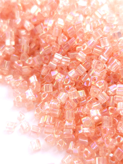 TOHO 8/0 Triangle Beads Transparent Rainbow Rosaline
