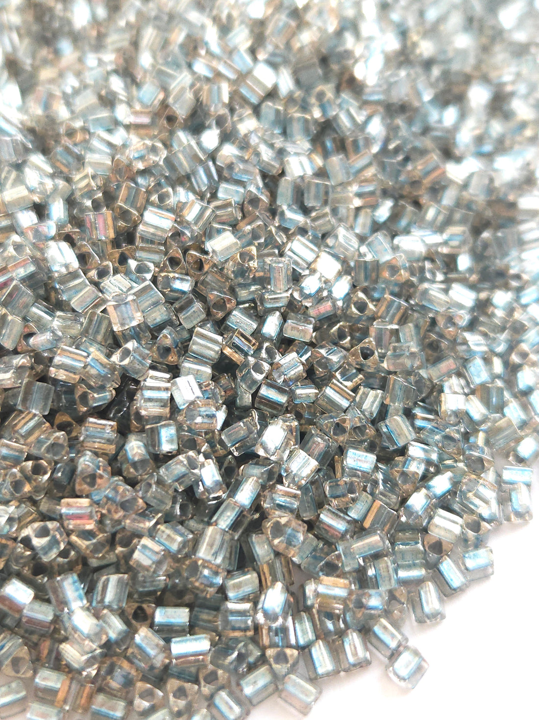 TOHO 8/0 Triangle Beads Inside Color Crystal Metallic Blue Lined