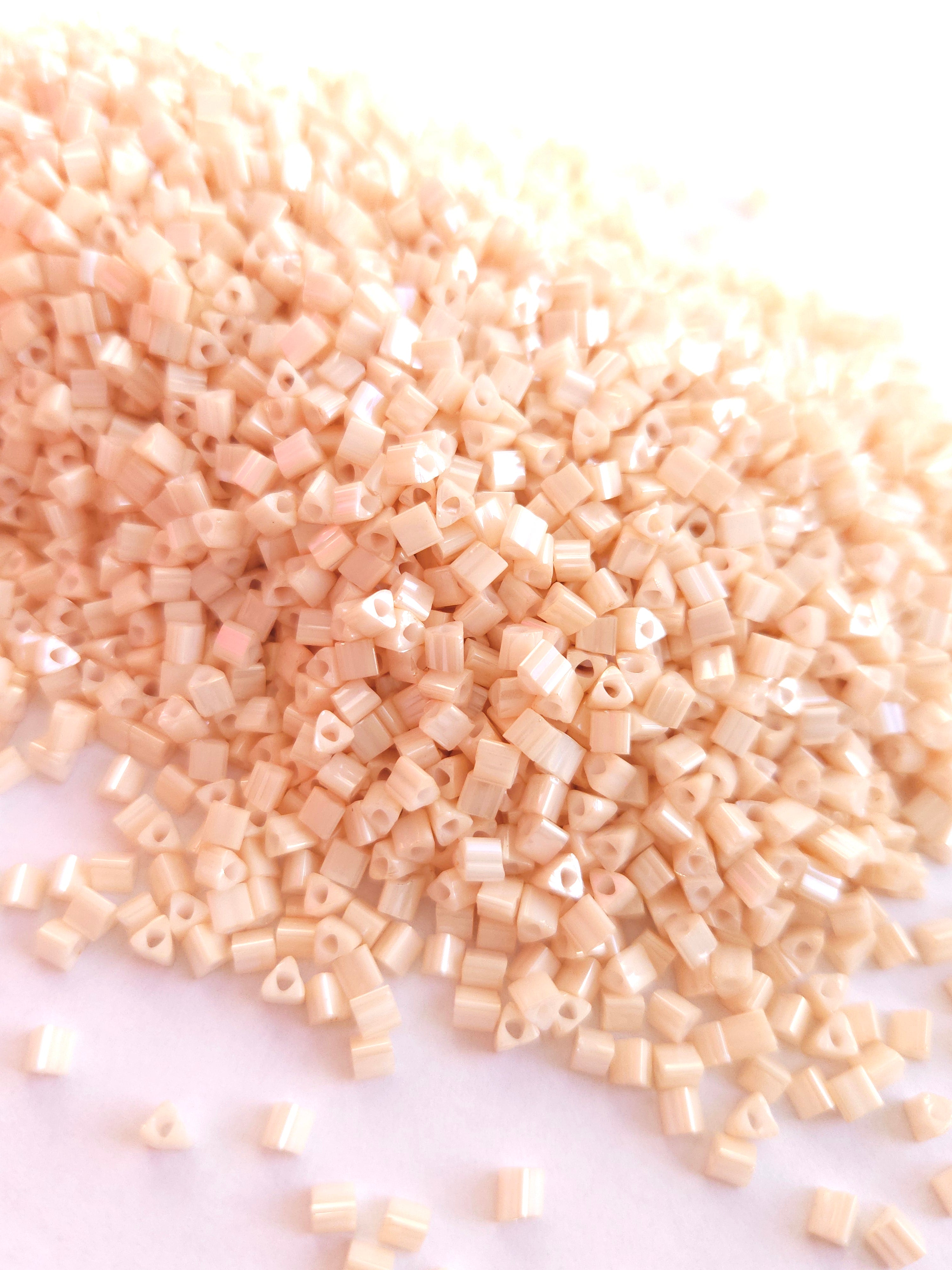 TOHO 8/0 Triangle Beads Opaque Lustered lt Beige