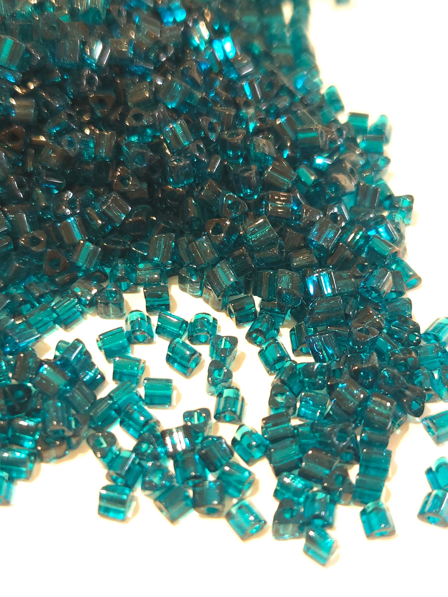 TOHO 8/0 Triangle Beads Transparent Capri Blue