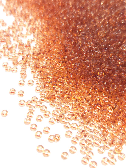 TOHO Demi Round 11/0 Transparent Warm Taupe